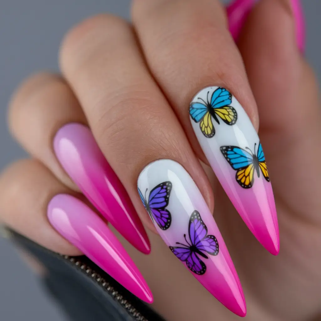 summer nail design ideas 2025 Pink Ombré Stilettos with Butterfly Flight