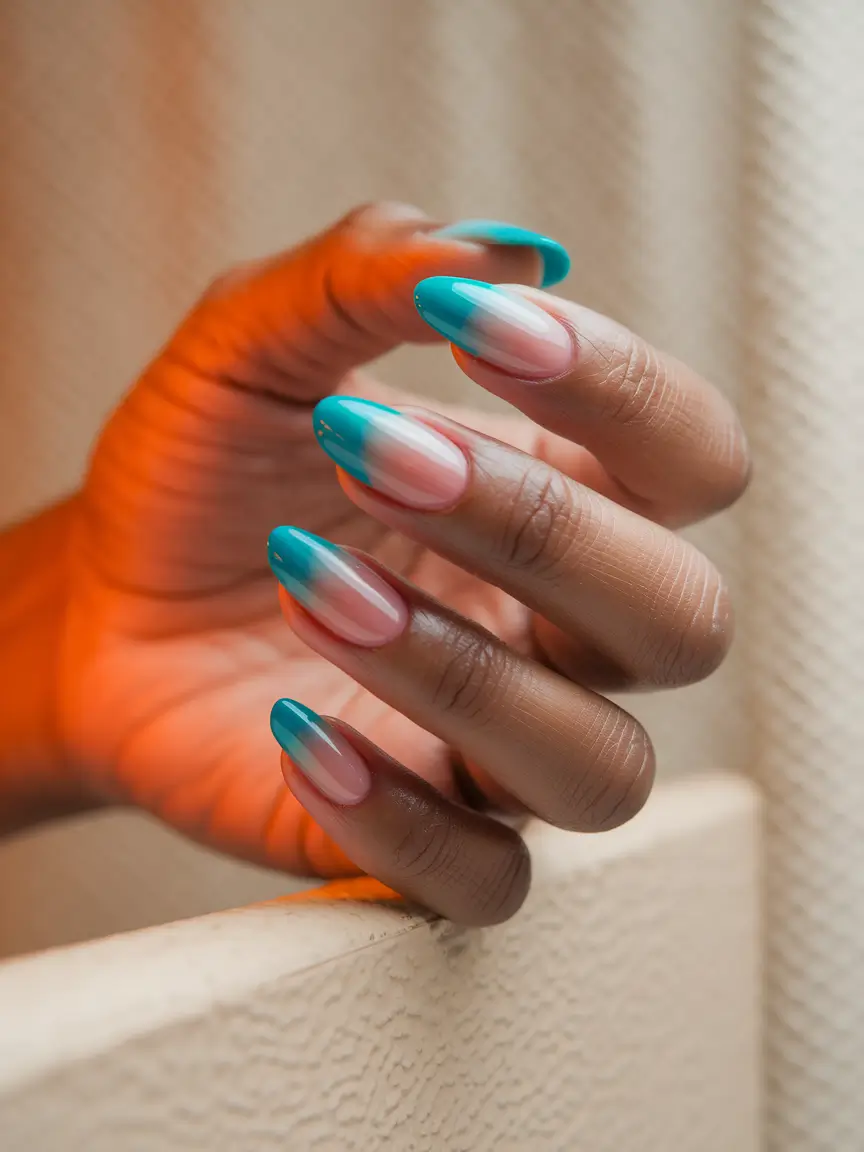 summer nail design ideas 2025 Teal Dip Tips with a Cool Ombre Fade