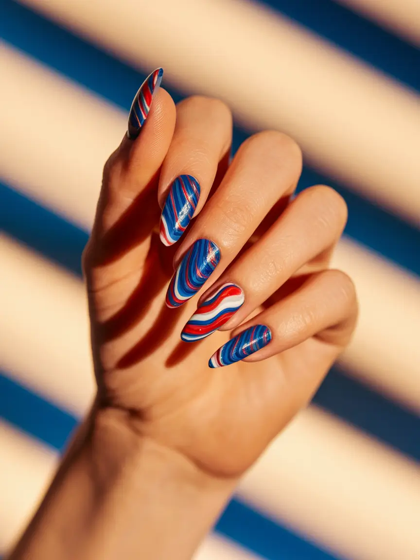 july nails ideas 2025 Electric Ribbon Swirls in Red, White & Blue