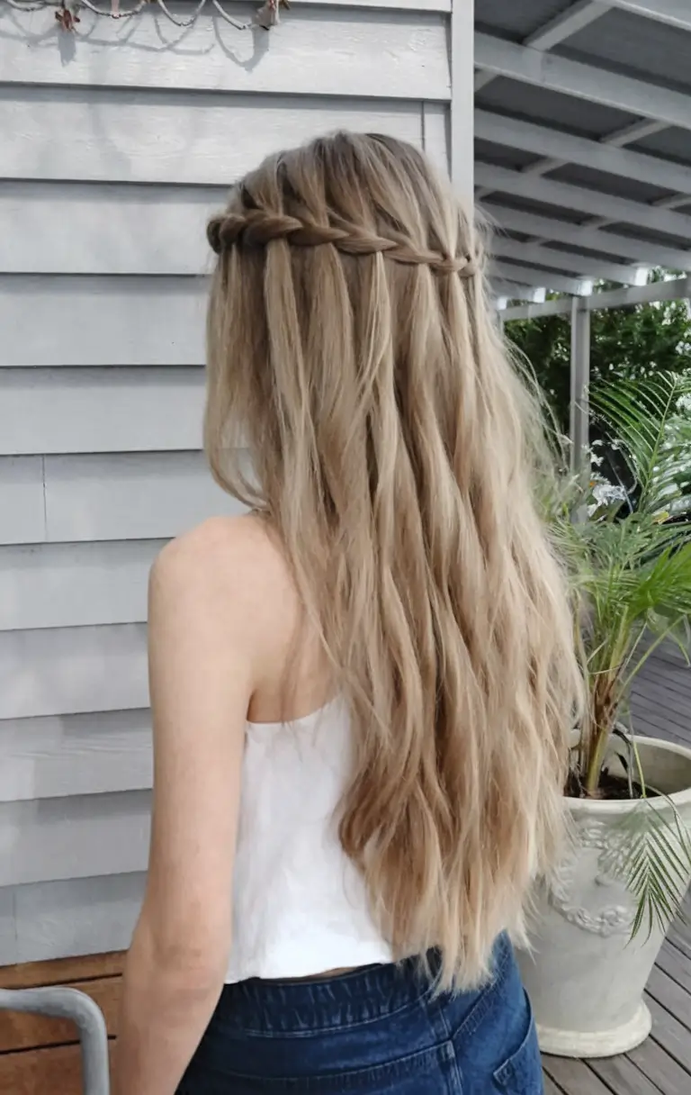 labor day hairstyles Loose Waterfall Braid with Natural Texture