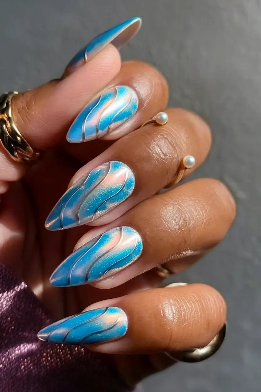 august nails designs almond Wavy Chrome Blue with a Beachside Glow