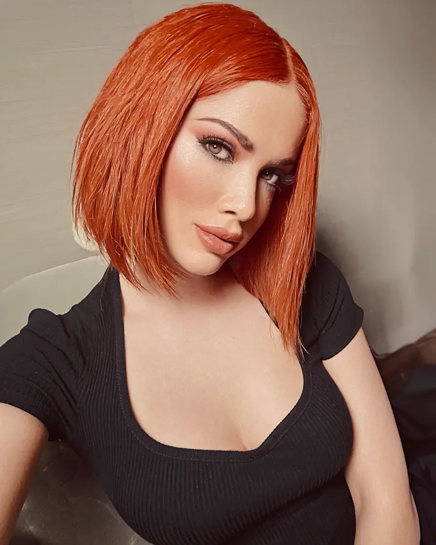 fall bob haircut ideas 2025+Bold Copper Bob with Side Part