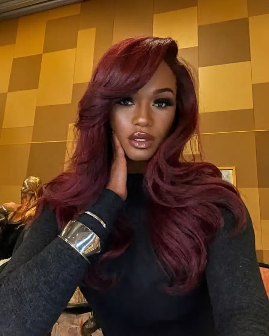 hair color ideas for deep tan skin Voluminous Wine Curls for Maximum Drama