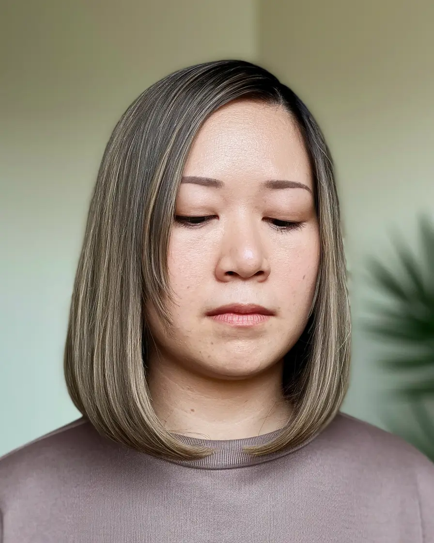oval face haircuts medium Blended Lob with Side Bangs and Soft Edges