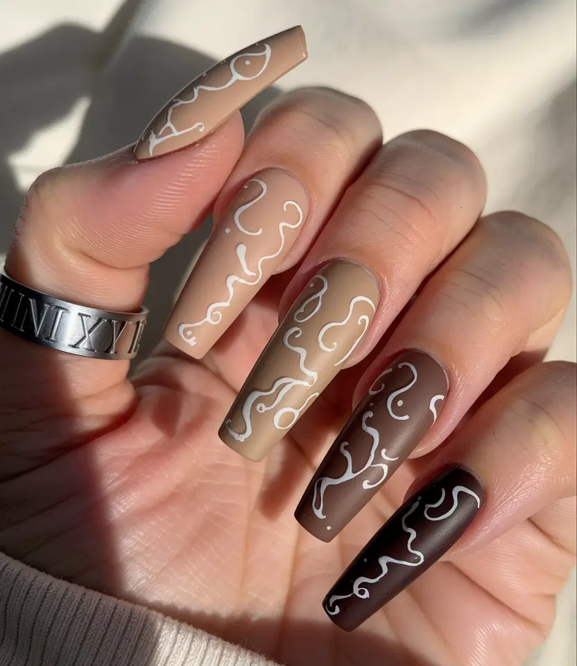 brown fall nails designs 2025 Minimalist Squiggle Accents on Matte Browns