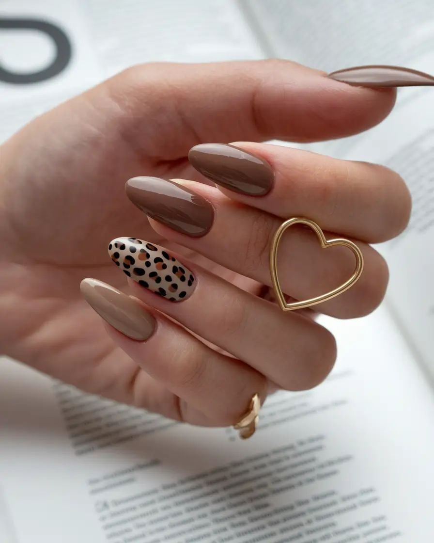 brown fall nails designs 2025 Animal Print Accent on Neutral Browns