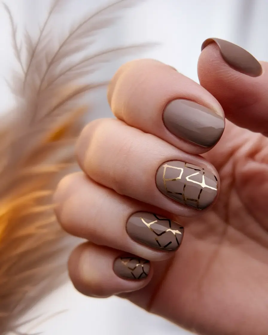 brown fall nails designs 2025 Constellation-Inspired Geometric Shorties