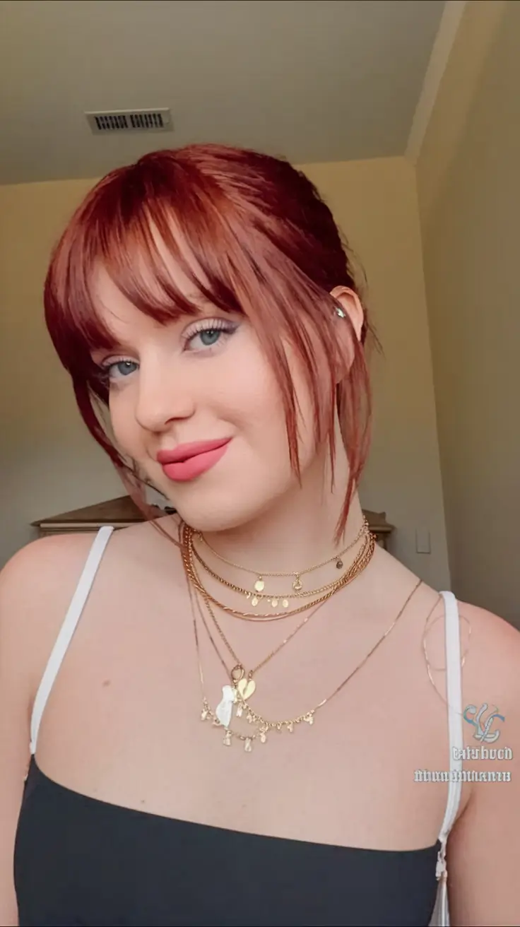 Burgundy Hair Inspiration for the Fall Season 2025 – Soft Auburn Updo with Wispy Fringe