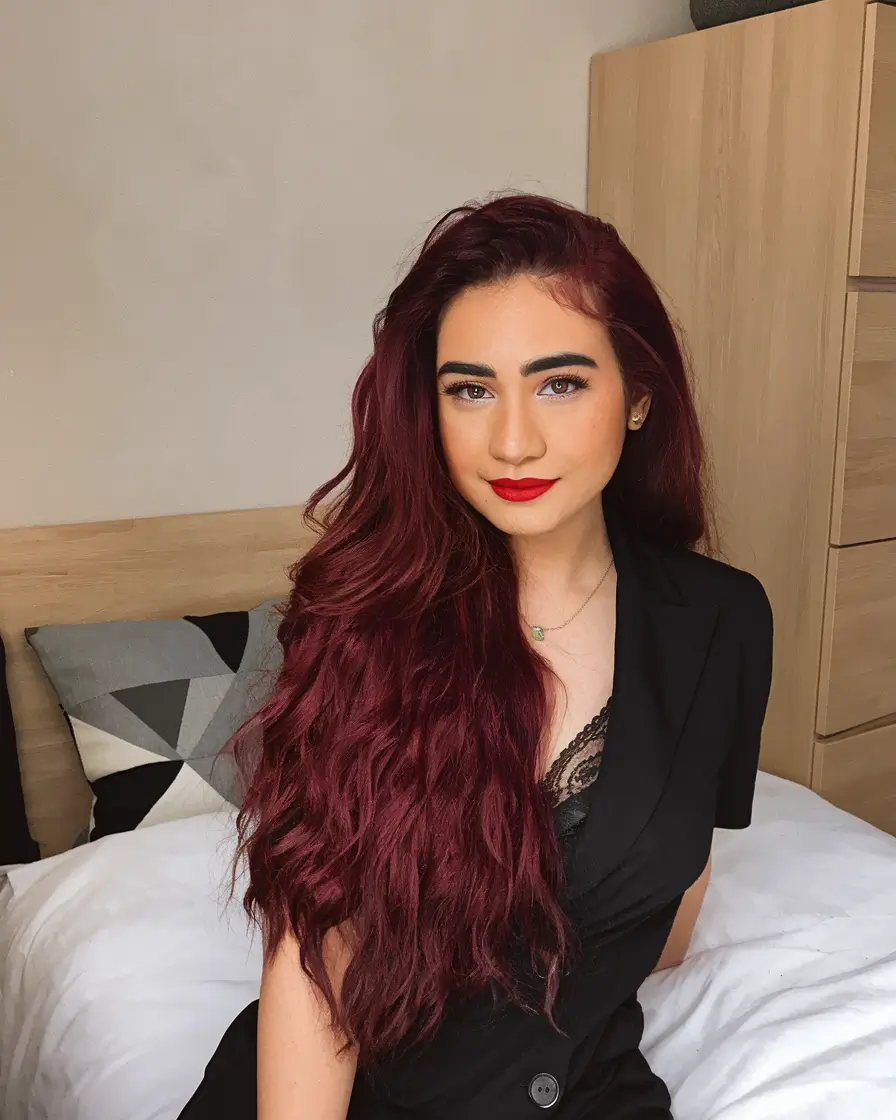 Burgundy Hair Inspiration for the Fall Season 2025 – Dark Wine Waves with Side Part