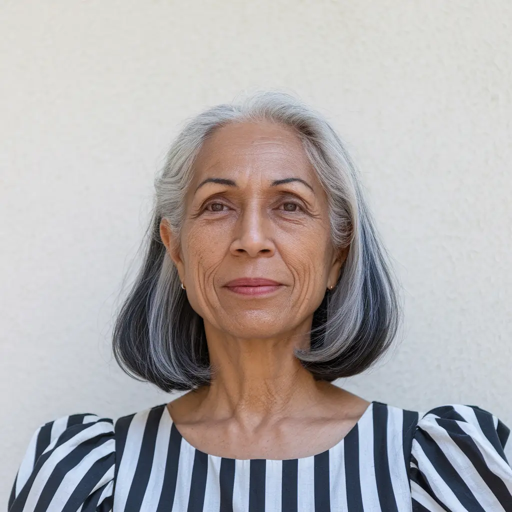 Elegant Fall hairstyles for Women Over 60 in 2025 – Graphite-Silver Classic Bob with Center Part
