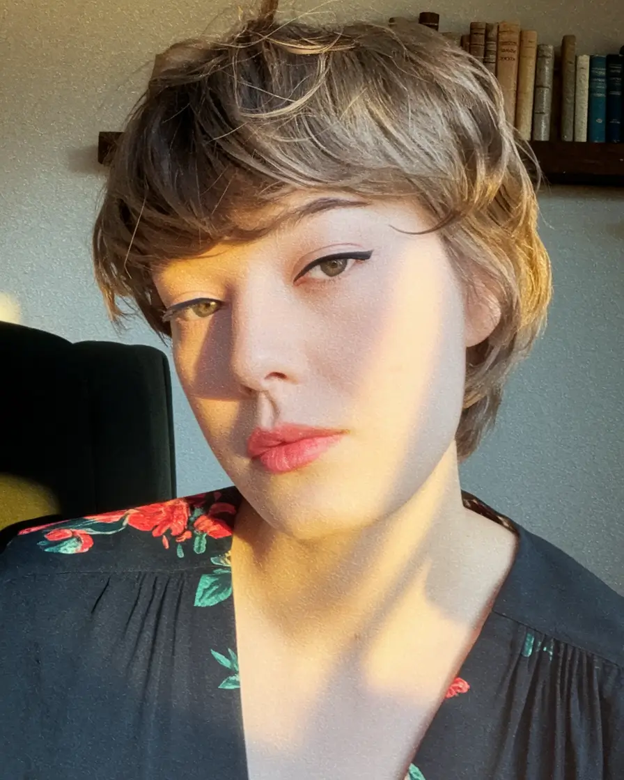 hairstyle for fall short hair Feathered Pixie with a Soft Fringe