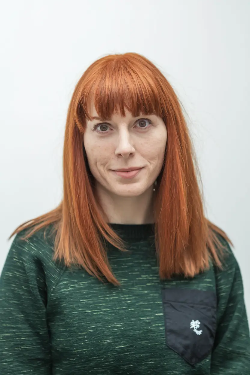 hairstyles for round faces Modern Auburn Cut with Blunt Bangs