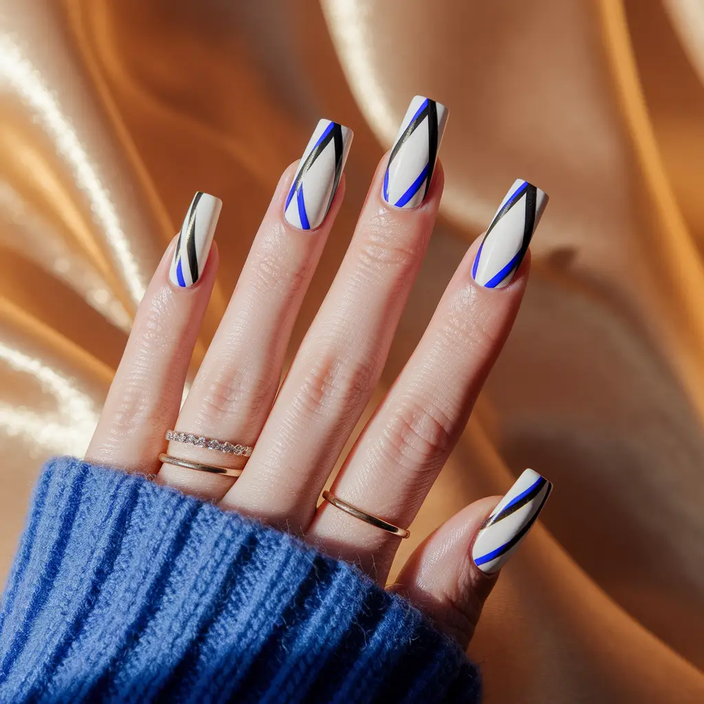 Fall ballerina nails 2025 – Geometric Blue and Black Accents