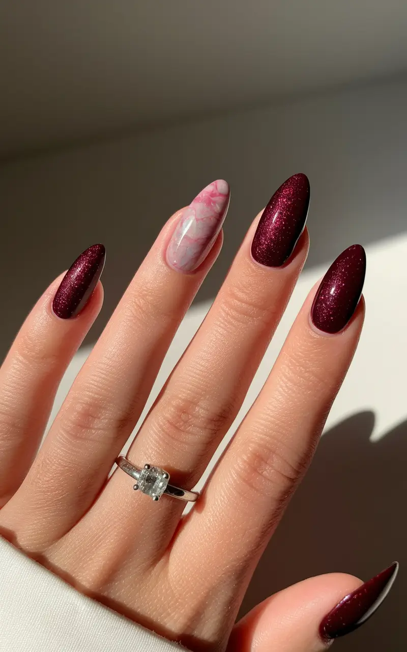popular fall nail colors 2025 Deep Burgundy with Marble Accent