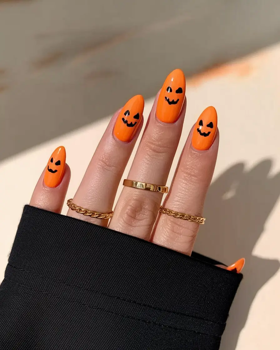 Trendy Cute and Fun Fall Nails 2025 Pumpkin Glow Faces