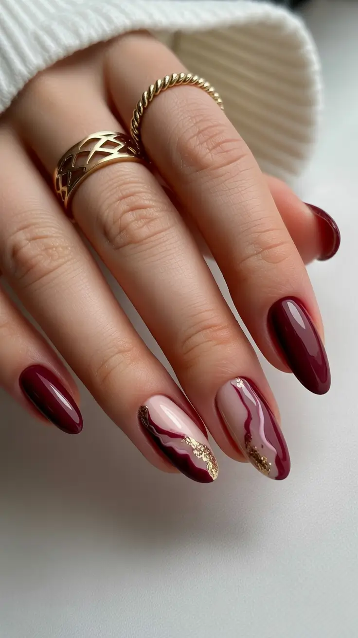 winter almond nails ideas Velvet Burgundy and Gold Wave Elegance