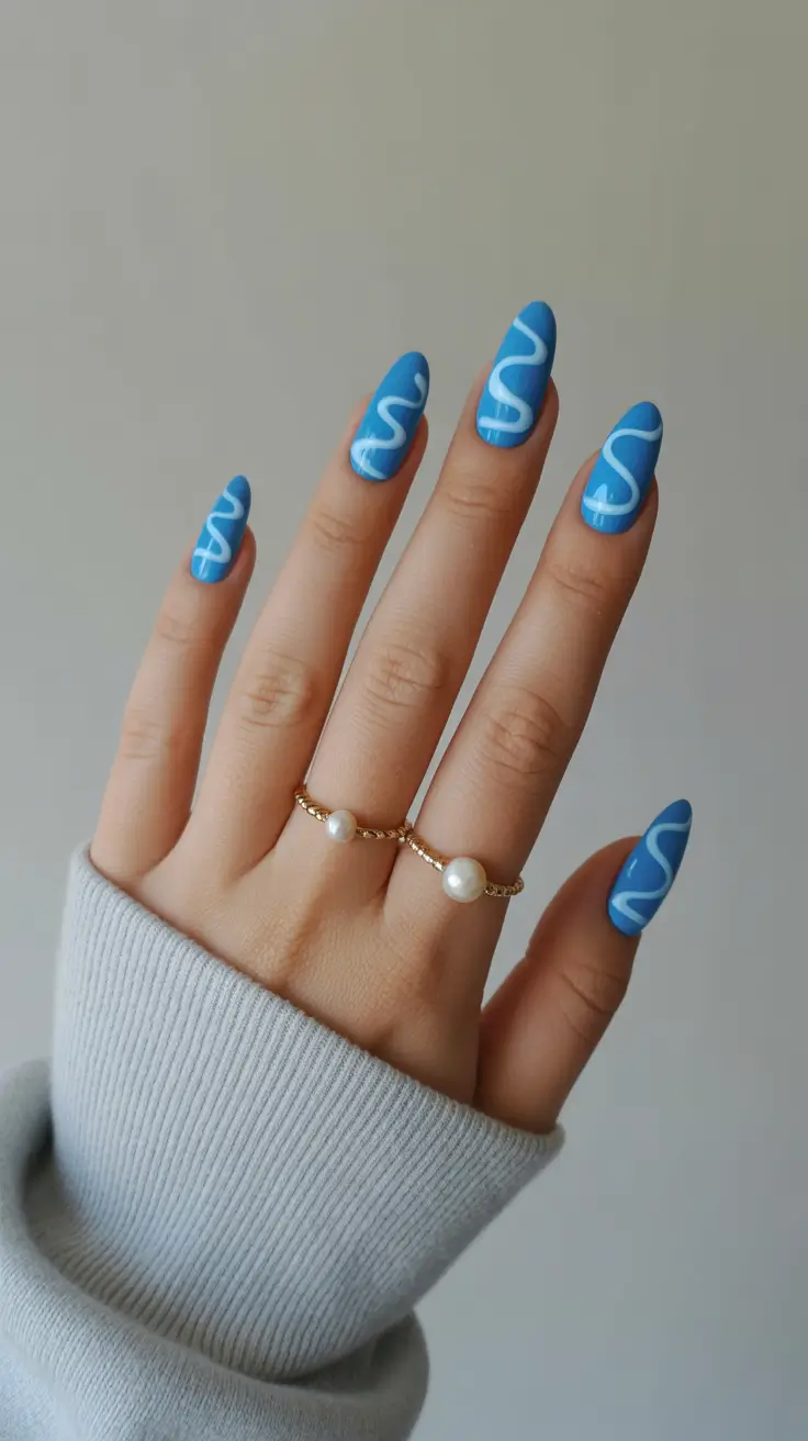 blue nail designs 2026 Playful Sky Waves