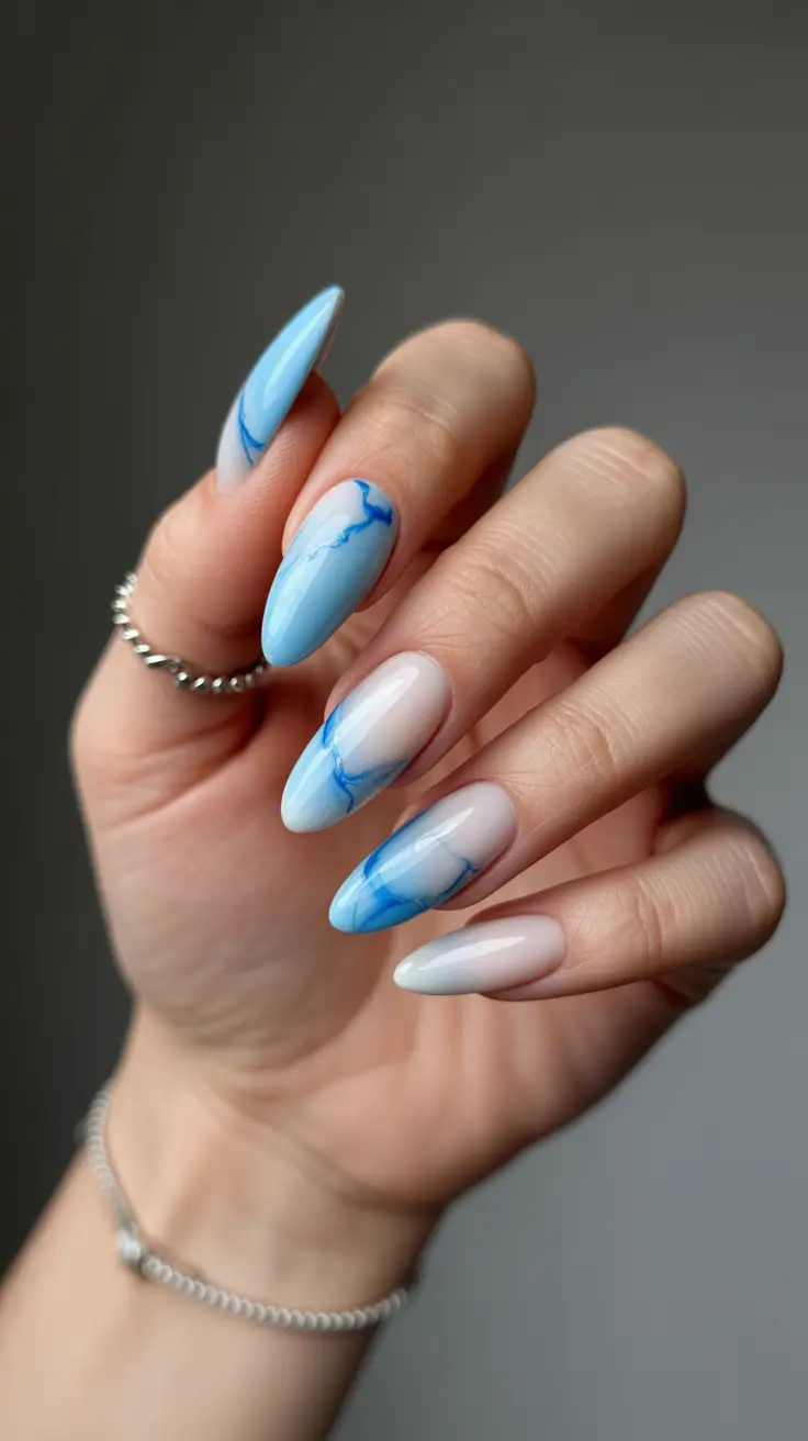 blue nail designs 2026 Soft Sky Marble Drift
