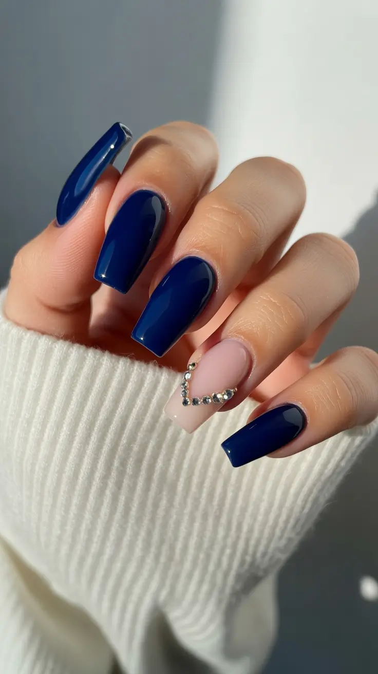 coffin nail designs 2026 Midnight Blue Luxury With a Crystal Heart Accent