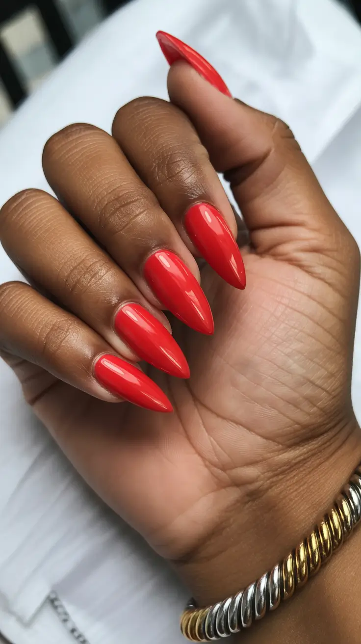 nail colors for brown skin 2026 - Flame Red Almond Shine