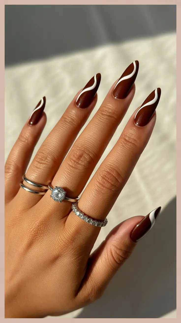 nail colors for tan skin 2026 Mocha Swirls With Luxe Contrast