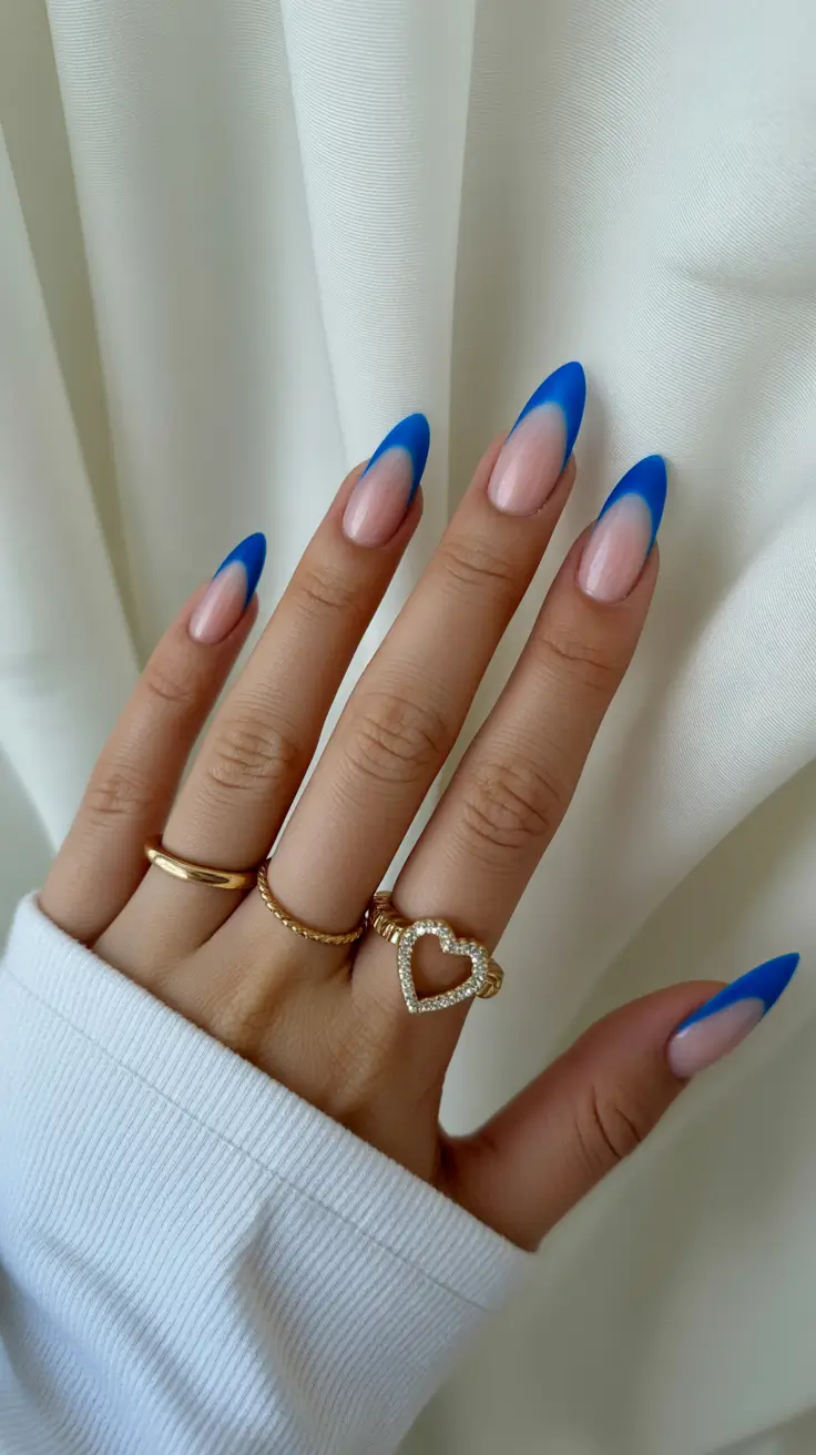 stiletto-nails-designs-2026-Cool-Blue-Airbrushed-Tips-for-a-Modern-French-Moment