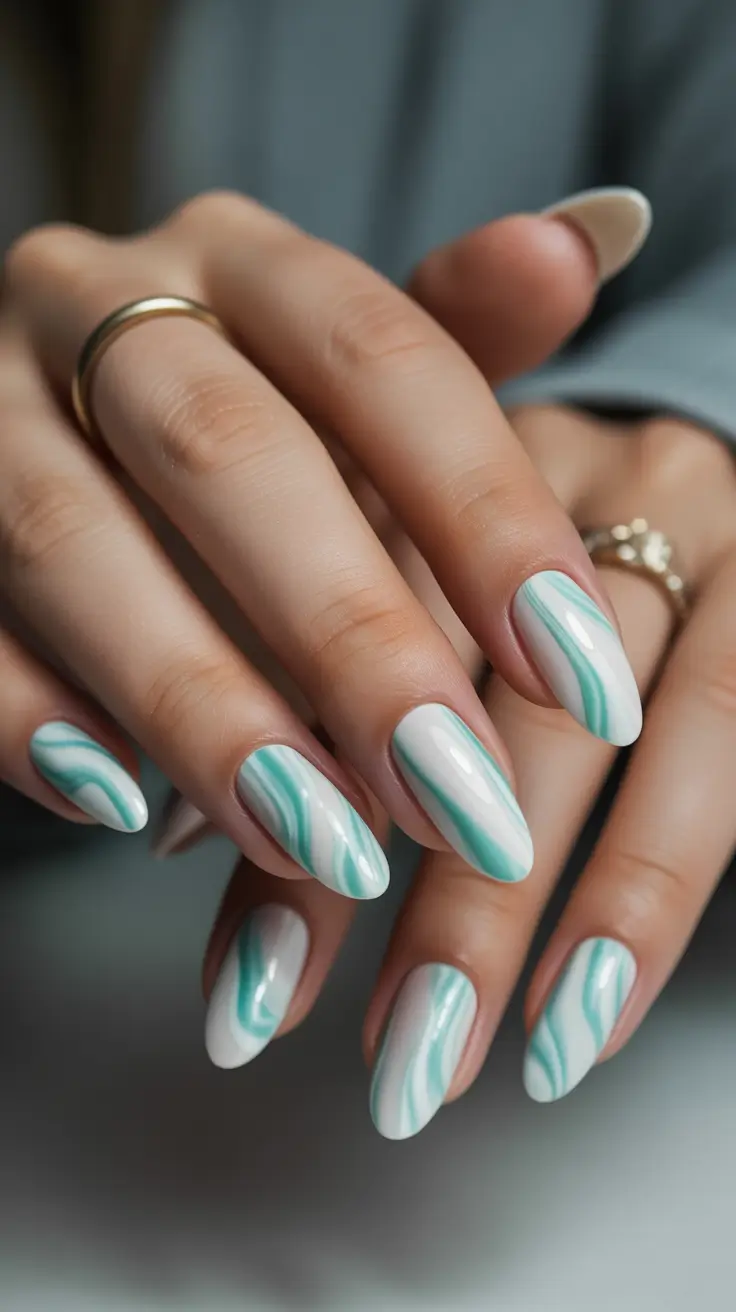 wedding nail designs for bride 2026 Mint and White Fluid Marble Almond