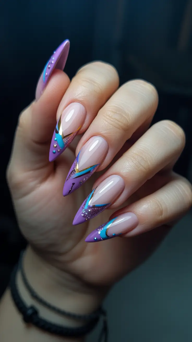 february nails 2026 Violet and Blue Graphic Almond With Gold Highlights