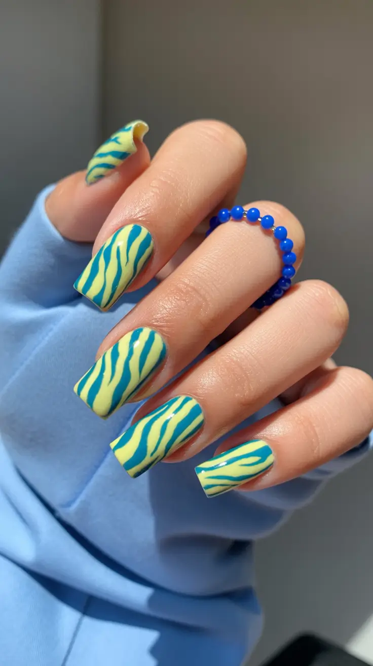 popular cute spring nails 2026 Vibrant Lime And Blue Wave Stripes