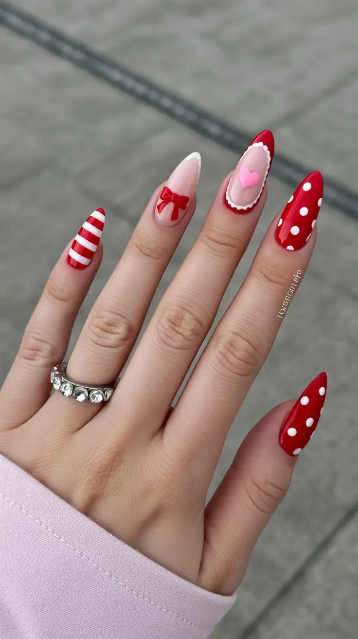 fun spring nails 2026 Candy Red Accents With Heartfelt Details