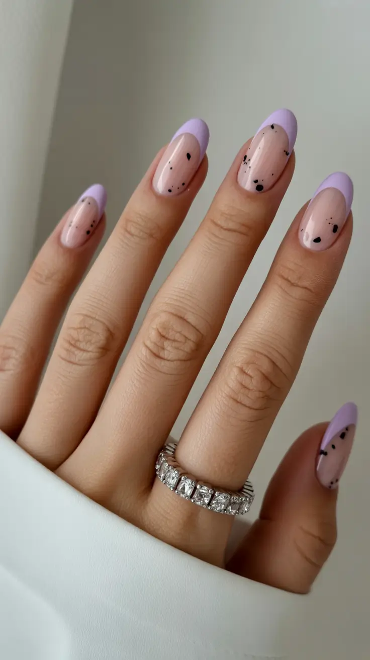 spring nail design 2026 - Soft Lilac Tips With Artistic Speckles