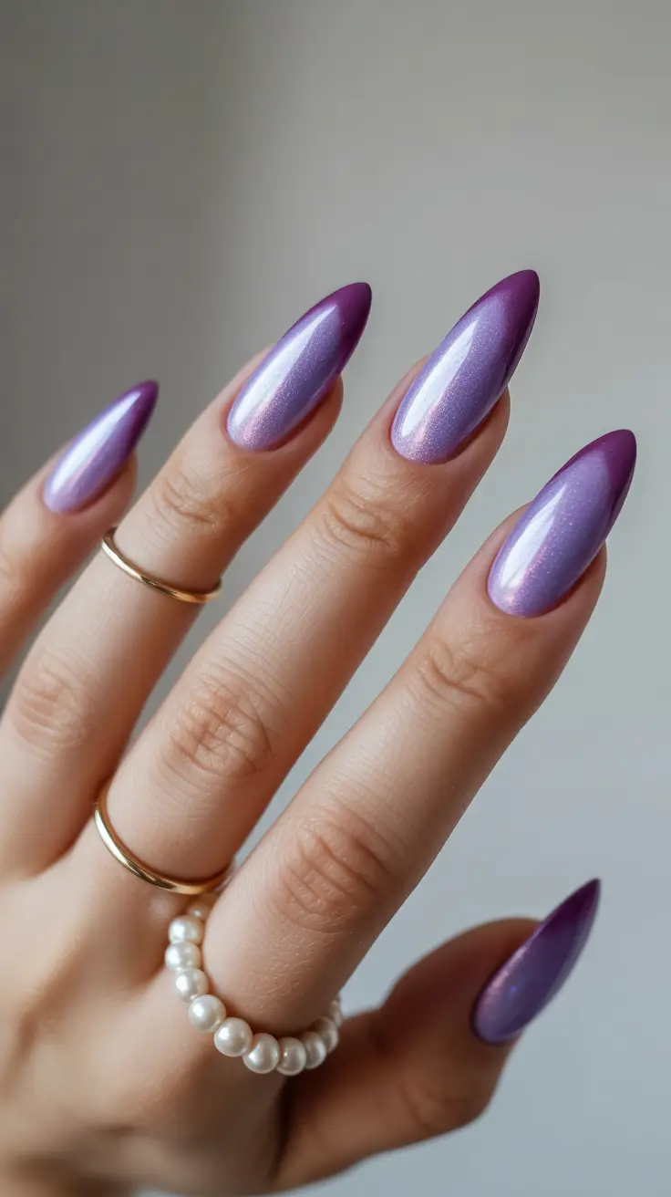 spring nail design 2026 - Purple Chrome Fade on Almond Silhouettes