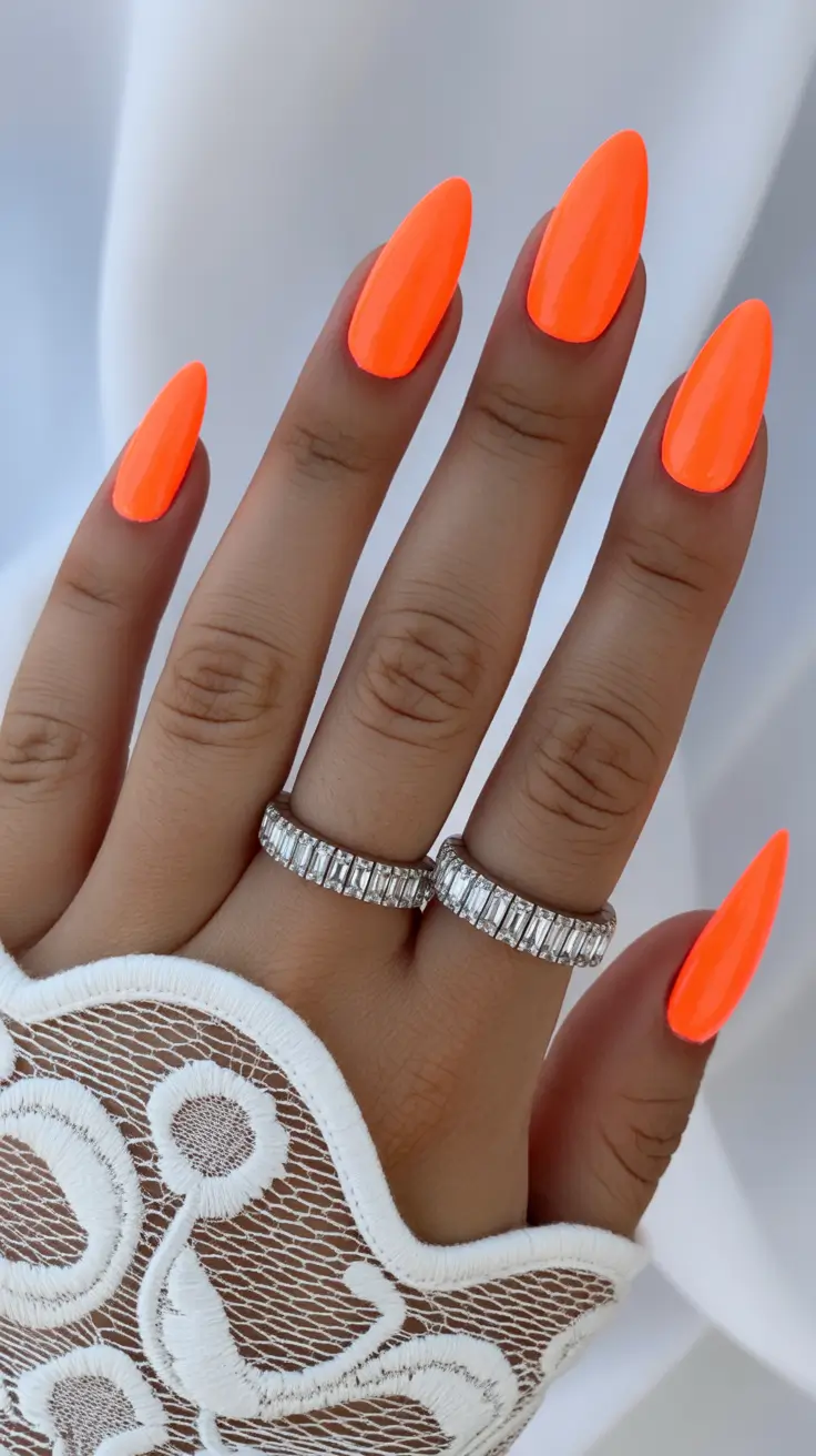 best spring stiletto nails 2026 Neon Tangerine Stiletto Nails That Instantly Brighten Spring Days