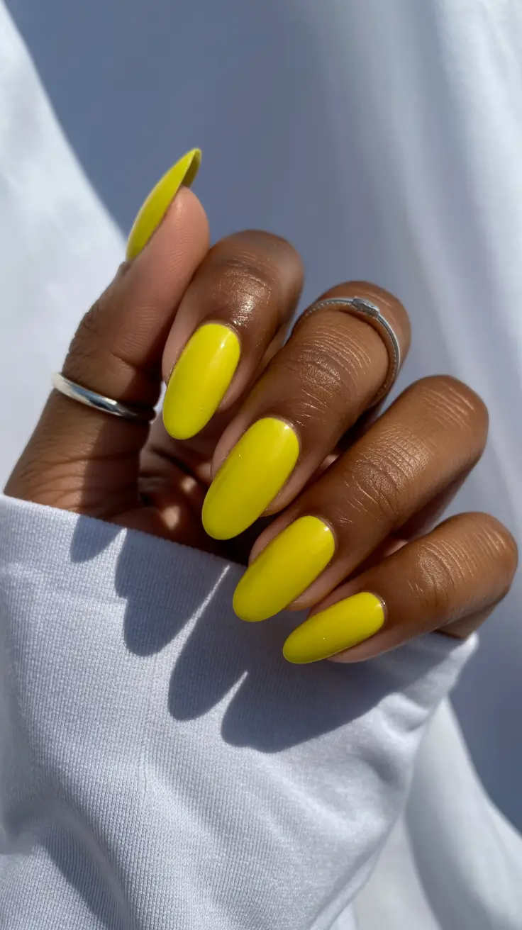 gorgeous spring nails for dark skin 2026 Sunshine yellow almond nails for radiant seasonal glow