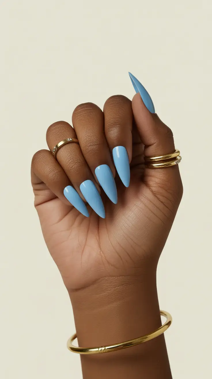 gorgeous spring nails for dark skin 2026 Powder blue stiletto for airy modern sophistication