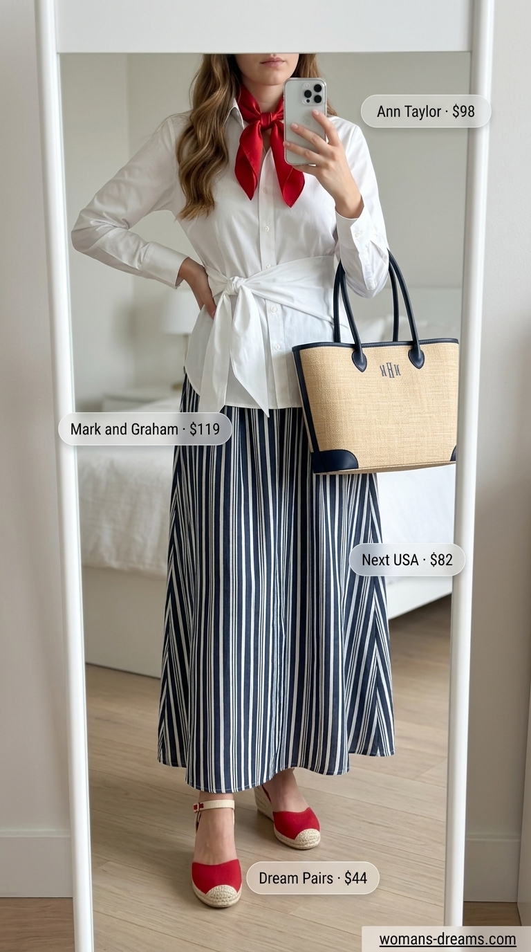 Sophisticated resort outfit with a navy and white striped pleated maxi skirt, white button-down, red espadrille wedges, and straw bag, showcasing long summer skirt outfits 2026.