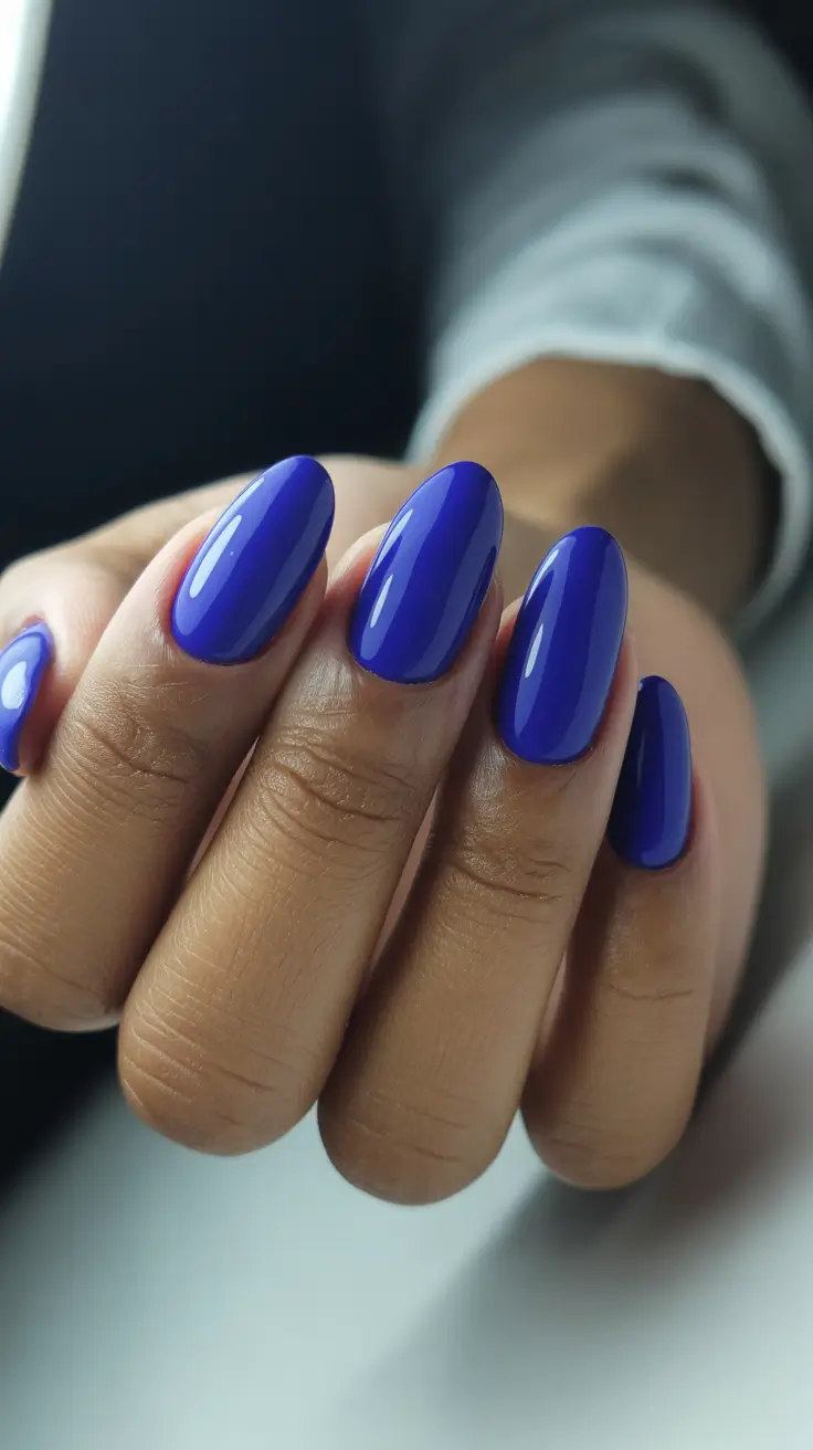 sophisticated spring nails for brown skin 2026 Electric Sapphire Gloss For Confident Spring Statements