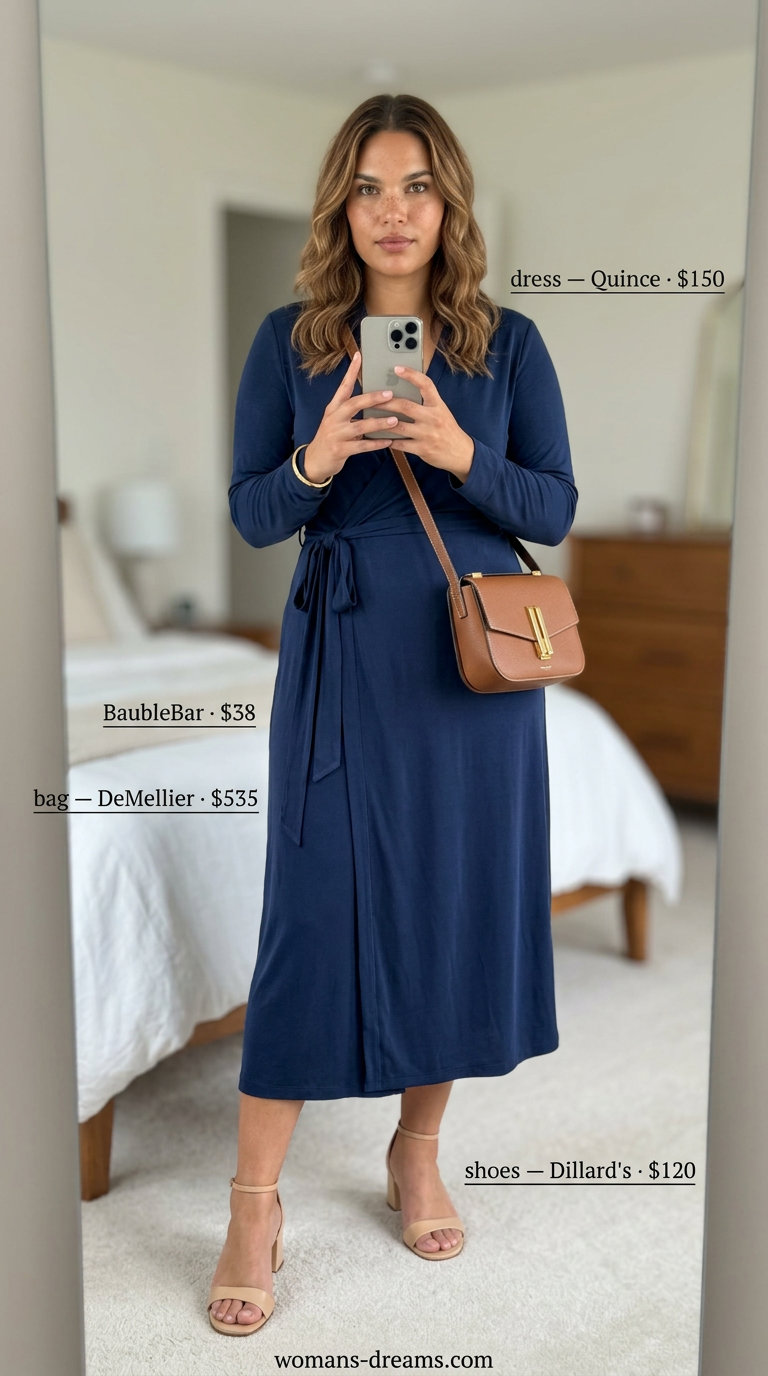 Navy wrap dress outfits 2026. Sophisticated smart casual look with block heels, shoulder bag, and gold bangle.