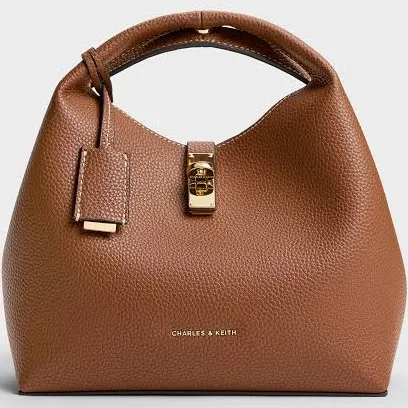 bag Charles & Keith Chance Turn-Lock Bucket Bag charleskeith.com $126