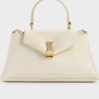 bag Charles & Keith Micro Lilibet Top Handle Bag charleskeith.com $63