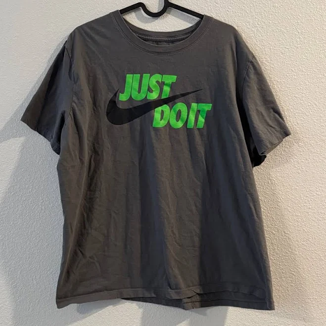 top Nike Shirts | Nike Men's Charcoal Tee With Neon Green Slogan | Color: Gray/Green | Size: Xl | Nikkistyles0820's Closet Poshmark $8