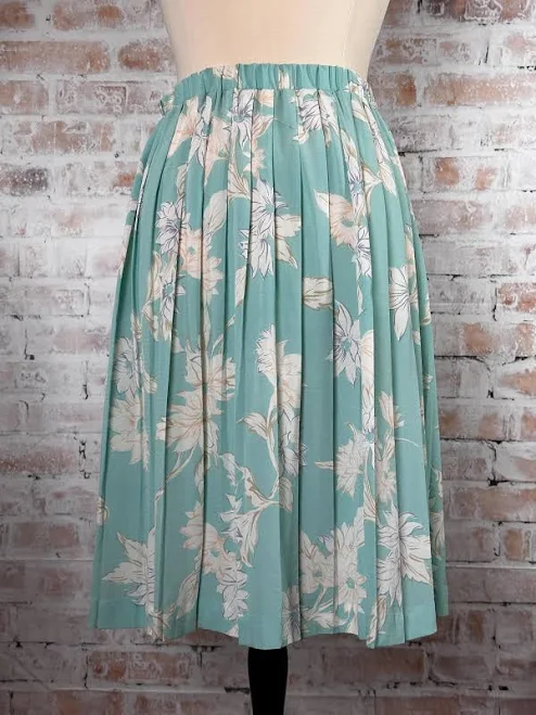mini skirt True Vintage 1970s Devon Women's Teal and White Tropical Floral Print Stretchy Elastic Waist Pleated Below-the-Knee Length Flowy Midi Skirt Etsy - Seller $35