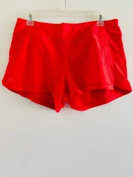 Athleta woman 2.5" running shorts w/ built-in brief, coral, M