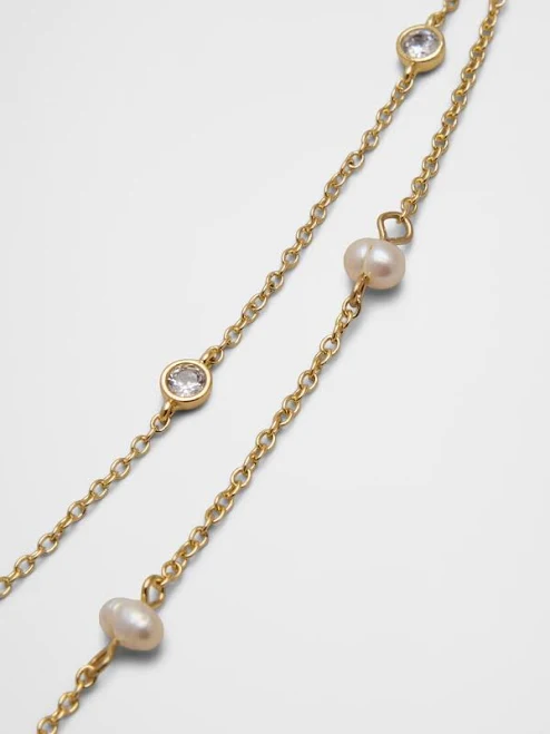 Delicate gold layered necklaces