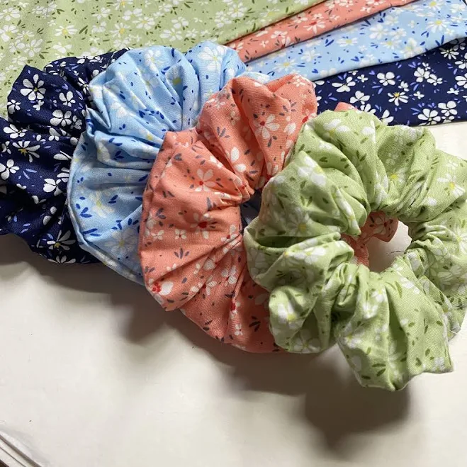 Oversized straw sun hat with black ribbon