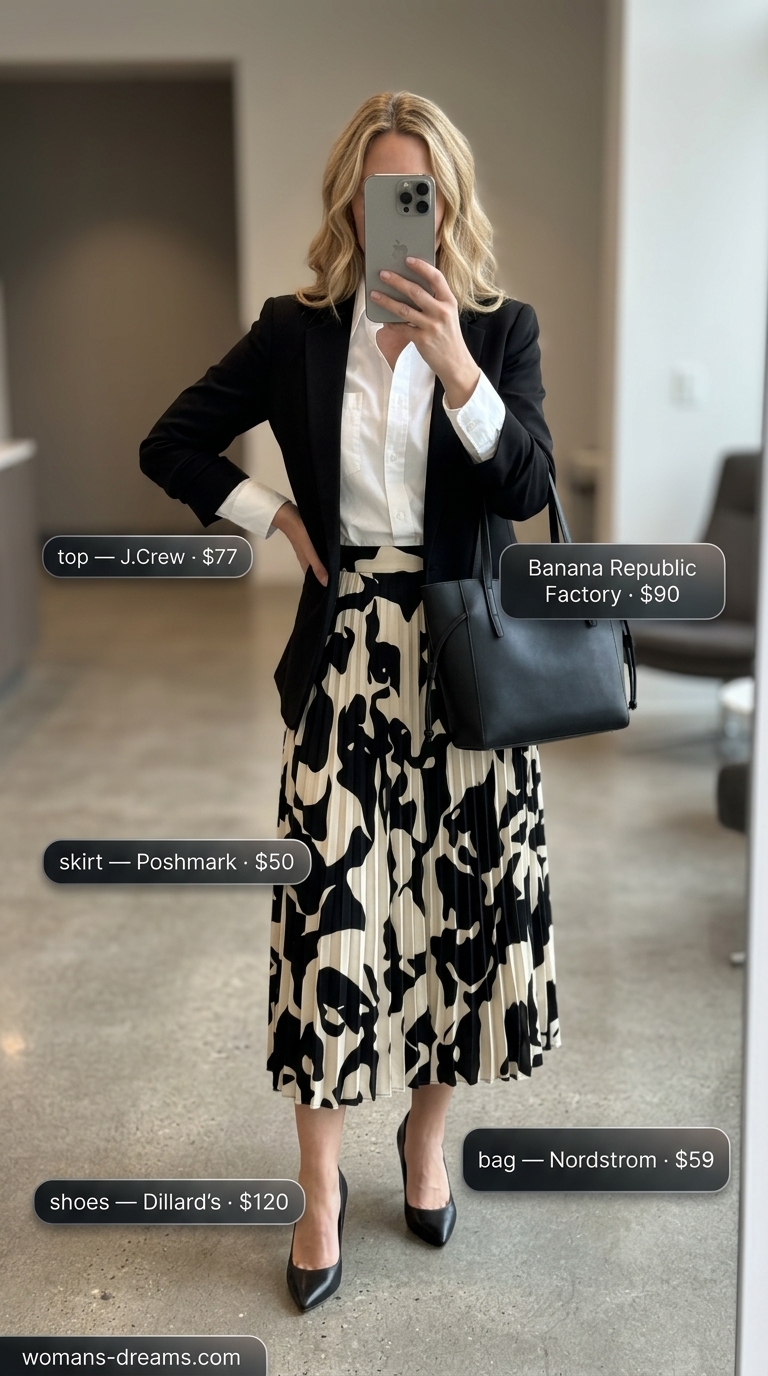 Summer business casual blazer outfit for women 2026: Skirt suit alternative with cream abstract print skirt, black blazer.