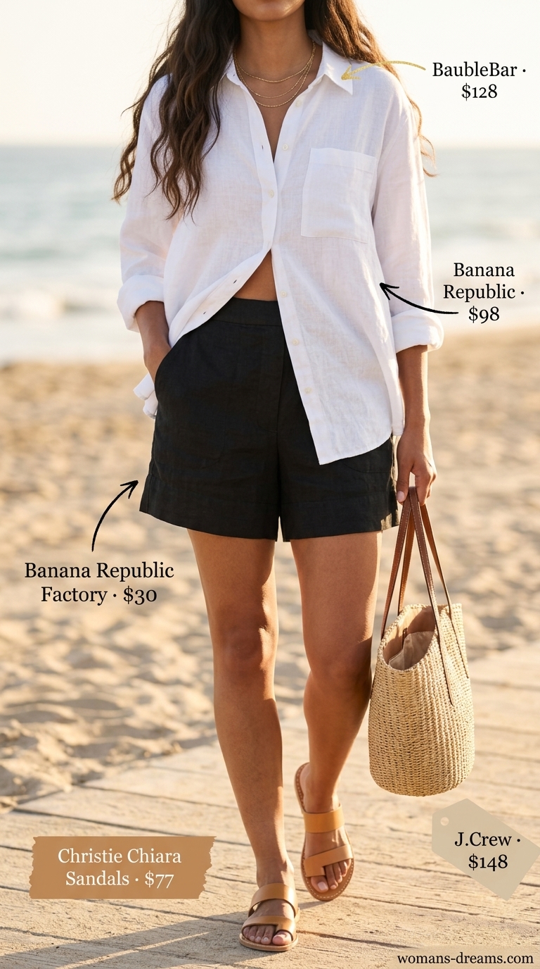 Black linen shorts with oversized white linen shirt for summer outfits for women with black hair 2026. Relaxed coastal or beach day look.