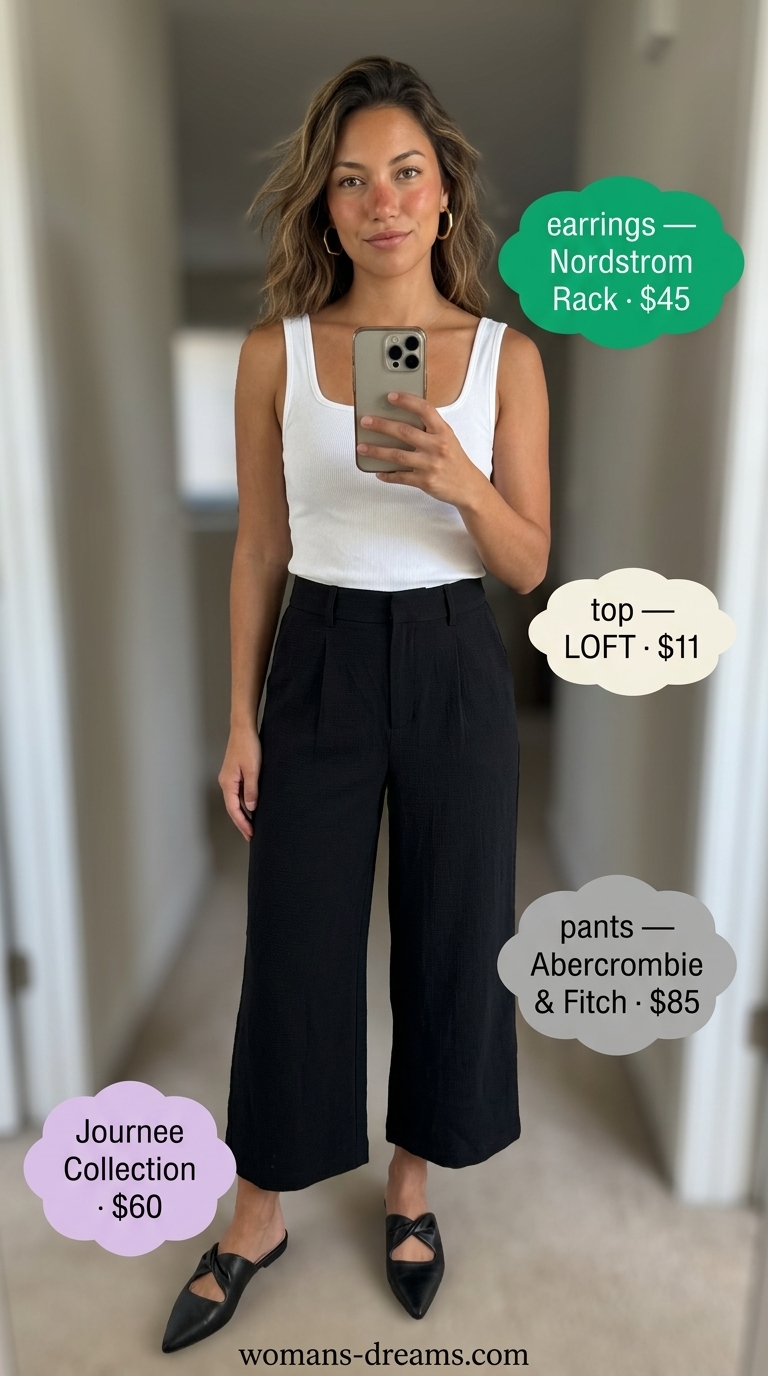 Black culottes, white knit top, and green bag for summer picnic outfits for women 2026.