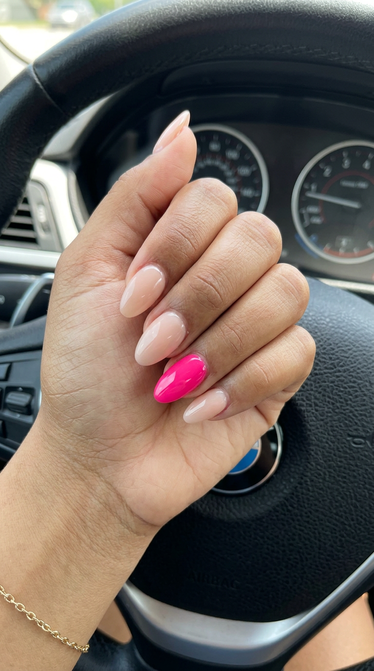 Solid Summer Nails 2026: Pink Pop Accent Chic milky nude nails with a hot pink accent nail for modern solid summer nails 2026.