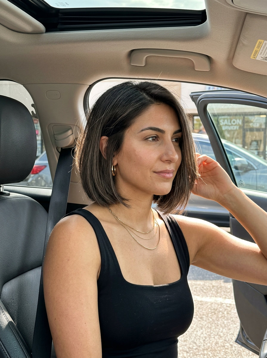 short smoked cedar balayage on jaw-length Italian bob with abundant internal texture — minimalist chic